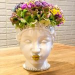 Cabeza diosa arcoiris